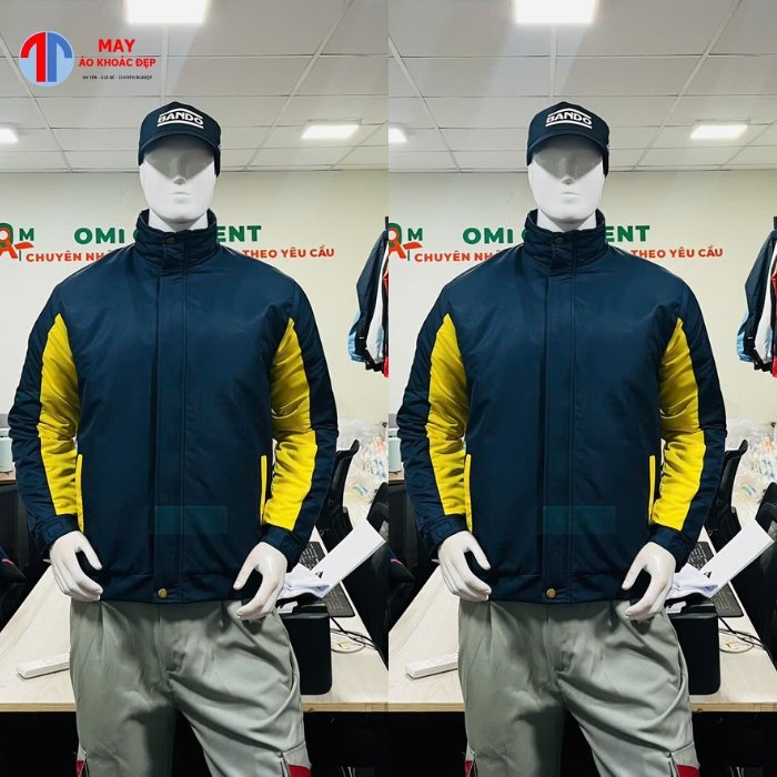 Ao-khoac-dong-phuc-mau-xanh-den-phoi-vang